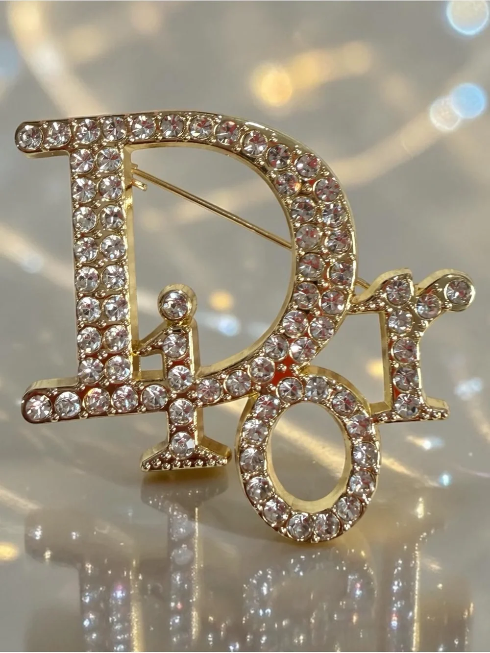 Gold-Tone Logo Brooch with Clear Crystals | New